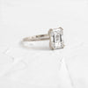 Zoom in on Product photo of 14k White Gold 1.7ct. Emerald-cut Solitaire Diamond Filament Engagement Ring featuring four double-prongs