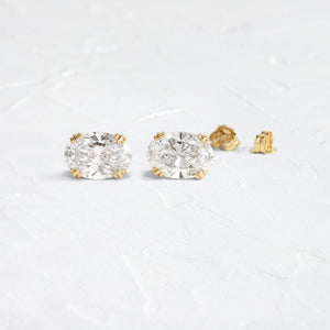 Product photo of 14k Yellow Gold 4ctw. Oval-cut Solitaire Diamond Threaded Stud Earrings featuring four triple-prongs|14k Yellow Gold