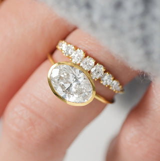 Photo features the Melanie Casey Formation Bezel Ring worn on a model's hand.