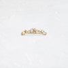 Product photo of 14k Yellow Gold Snowdrift Wedding Band featuring scattered diamonds on a Curved band